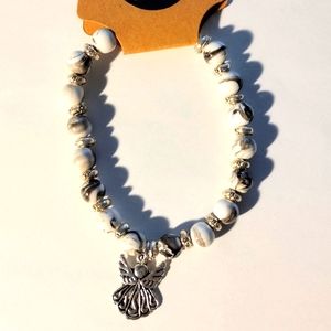 Black and White marble beaded bracelet with angel charm